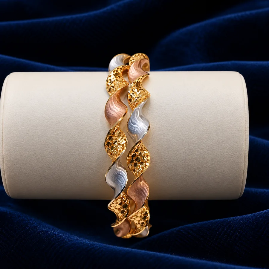 A pearl and gold cascade bracelet photographed up close